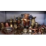 A quantity of copper and brass to include Turkish coffee pots, horse brasses and a vintage upright