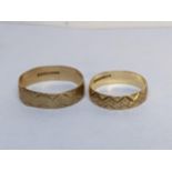 Two 9ct gold wedding bands with engraved decoration, 3.7g Location: