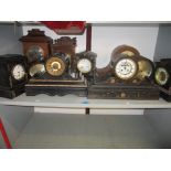 A group of five Victorian black slate and marble mantel clocks, Victorian oak and mahogany mantel