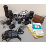 A group of vintage cameras and accessories to include a Pentax Asahi, a Ricoh TLS 401 and a Pentax