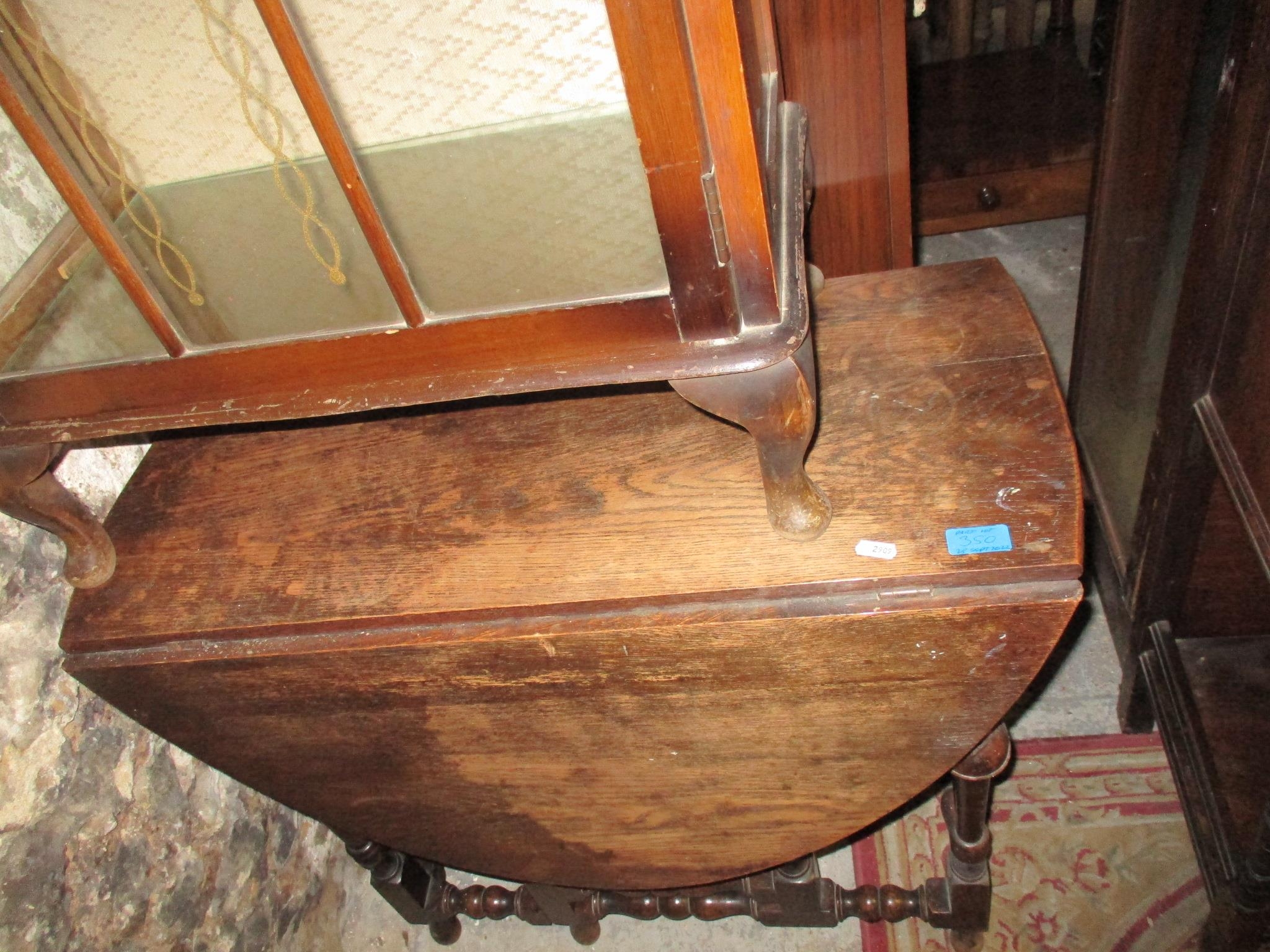 An early 20th century mahogany display cabinet with glazed door and glass internal shelves, on short - Image 3 of 3