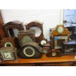 A mixed lot of Victorian mantel clock cases, and later examples with movements, all for repairs