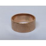 A 9ct gold wedding band, 5.4g Location: