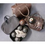 A set of 4 vintage Bishops Park bowls and smaller white ball housed in a brown bowling bag