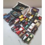 Diecast collectors vehicles to include Burago, Lledo delivery advertising vans, Corgi and Dinky