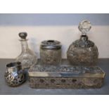 Silver dressing table items to include two scent bottles, two pin pots, and a scent bottle lid