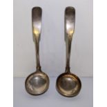 A pair of early 19th century Scottish silver ladles, hallmarked Edinburgh 1824, 75.1g Location: