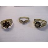 Three 9ct gold rings each set with coloured stones or diamonds, 7.45g Location: