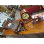 Three late 19th/early 20th century clocks to include an Edwardian inlaid mantel clock, a walnut