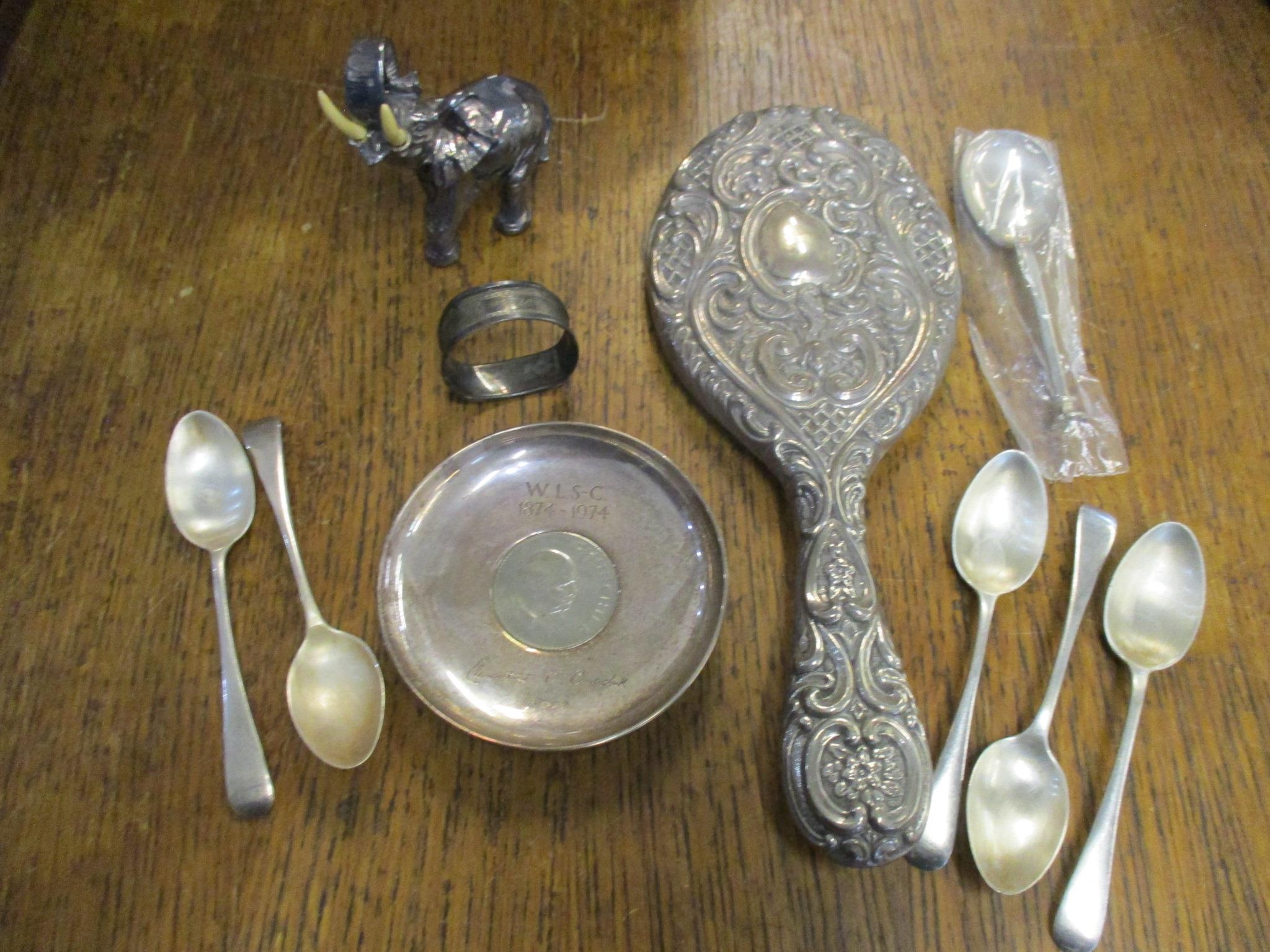 A mixed lot of silver items to include a Clementine Churchill commemorative coin pin dish,
