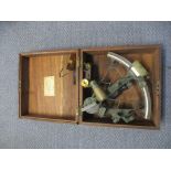 A nautical 19th century sextant in lacquered brass with rosewood handle, with spare, lenses,