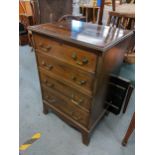 A reproduction mahogany small chest of four graduating long drawer, 83cm h x 56cm w Location: