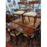 A Victorian mahogany extending dining table with two extra leaves, 77cm h x 154cm w, unextended,