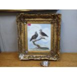 A 20th century watercolour of two birds, contained in an ornate gilt frame A/F Location: