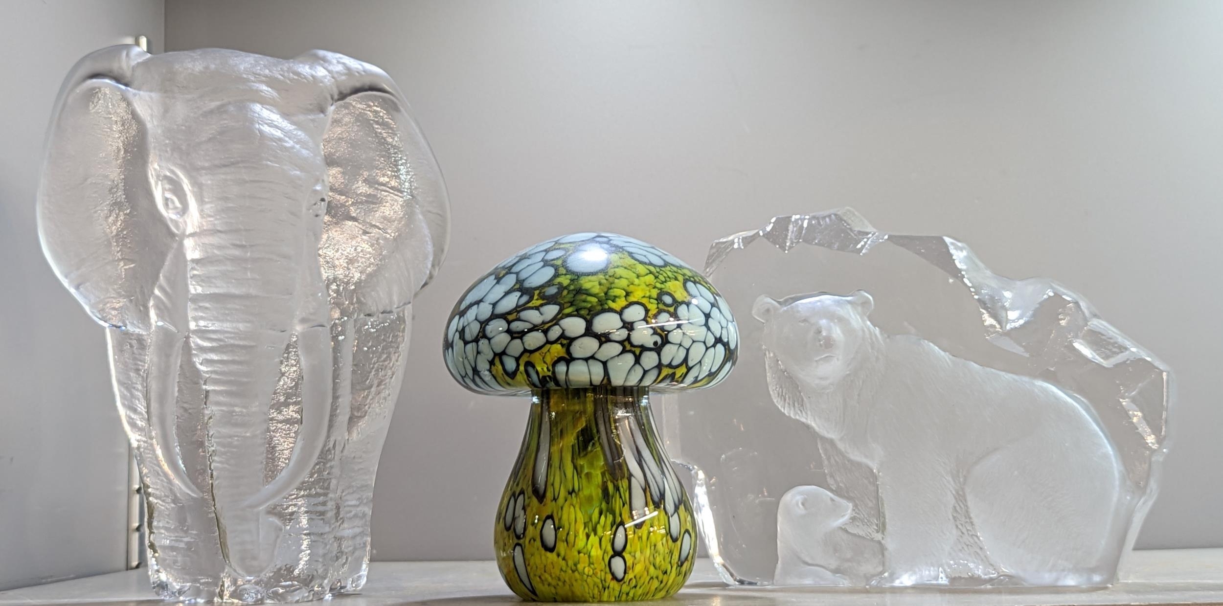 Two mats Jonasson glass sculpture of an iceberg containing a polar bear and a cub an Elephant A/F,