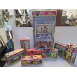 A collection of Sindy house furniture to include a Sindy house and doll, washbasin, sink unit, bath,