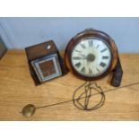 A late 19th century postman's alarm with a painted dial and a 1930's oak cased clock Location: