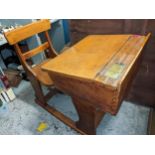 An early 20th century oak and elm school desk and integrated chair Location: