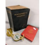 A 1935 issue Machinery's Handbook, Engineers compass and Daily Prayer book Location: