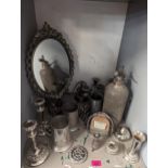A mixed lot of silver plate and metalware to include a decorative mirror A/F, soda stream, candle