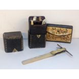 A miniature ladies companion set in the form of a book, a POW straw and leather purse and a mother