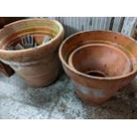 Four terracotta garden plant pots, largest 47cm h, 50cm dia A/F Location: