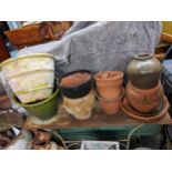 Nine terracotta and ceramic garden plant pots Location: