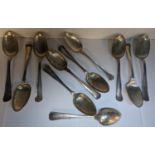 A group of eleven mixed silver Danish tablespoons, having various monograms and some stamped, Prahl,