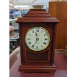 A late 20th century Sewills mahogany cased mantle clock, with mechanical movement