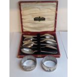 Six mixed silver teaspoons and two Egyptian Niello silver napkin rings Location: