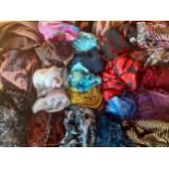 A quantity of modern scarves and wraps to include Winser, Tie Rack, Besarani Collection,
