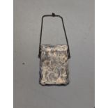 A Victorian silver card case having floral decorated engraving and initials E.M.K. Location: