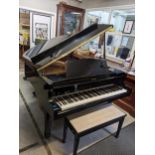 A Yamaha G1 baby grand piano, numbered R4214406, with footstool 101cm h x 148cm w x 160cm d