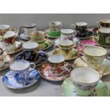 A collection of coffee cans and saucers to include Royal Albert Old Country Roses, Crown Ducal,