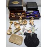 A mixed lot to include a draughts set, Indian carved box, pin head dolls, sterling silver enamel