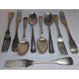 A group of nine Danish silver spoons and forks to include four spoons and five forks stamped W.