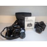 A pair of Canon camera A/F to include a Canon Powershot 5 x 40 HS and a Power Shot S x 1 15,