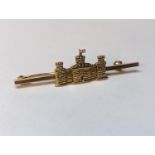 A 9ct gold bar brooch in the form of the Inniskilling Fusiliers Regiment, 4.6g