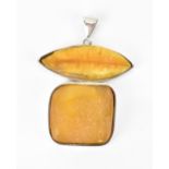 An Ivone Brosch silver pendant set with amber, fashioned as a conjoined lozenge and a square, signed