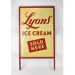 A vintage 'LYONS ICE CREAM' advertising tin sign, reading 'LYONS ICE CREAM SOLD HERE' in red