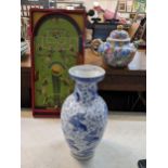 A Chinese blue and white fish decorated vase together with a large floral teapot and a Soccatelle