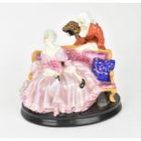 An early Royal Doulton porcelain figure of 'Tete a Tete' by Harry Allen, HN798, modelled as an