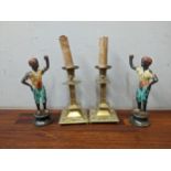 A pair of 20th century painted bronze table top blackamoor lamp bases and a pair of brass