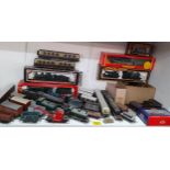 A collection of 00 gauge model railway engines, rolling stock and accessories to include GWR engines
