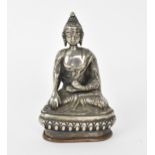 A small 19th/early 20th century Sino-Tibetan statue of Buddha Shakyamuni, in plated bronze with