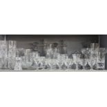 A group of domestic glassware to include cut glass decanters, cups, dishes, bowls and others