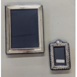 A silver framed photo frame, hallmarked Sheffield 1995, 12cm x 15.5cm, together with a smaller