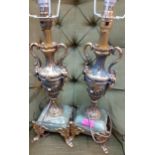 A pair of green onyx and gilt painted urn table lamps Location: RAM