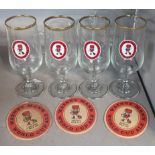 A group of four Watney Mann World Cup ale glasses, three matching beer mats along with two