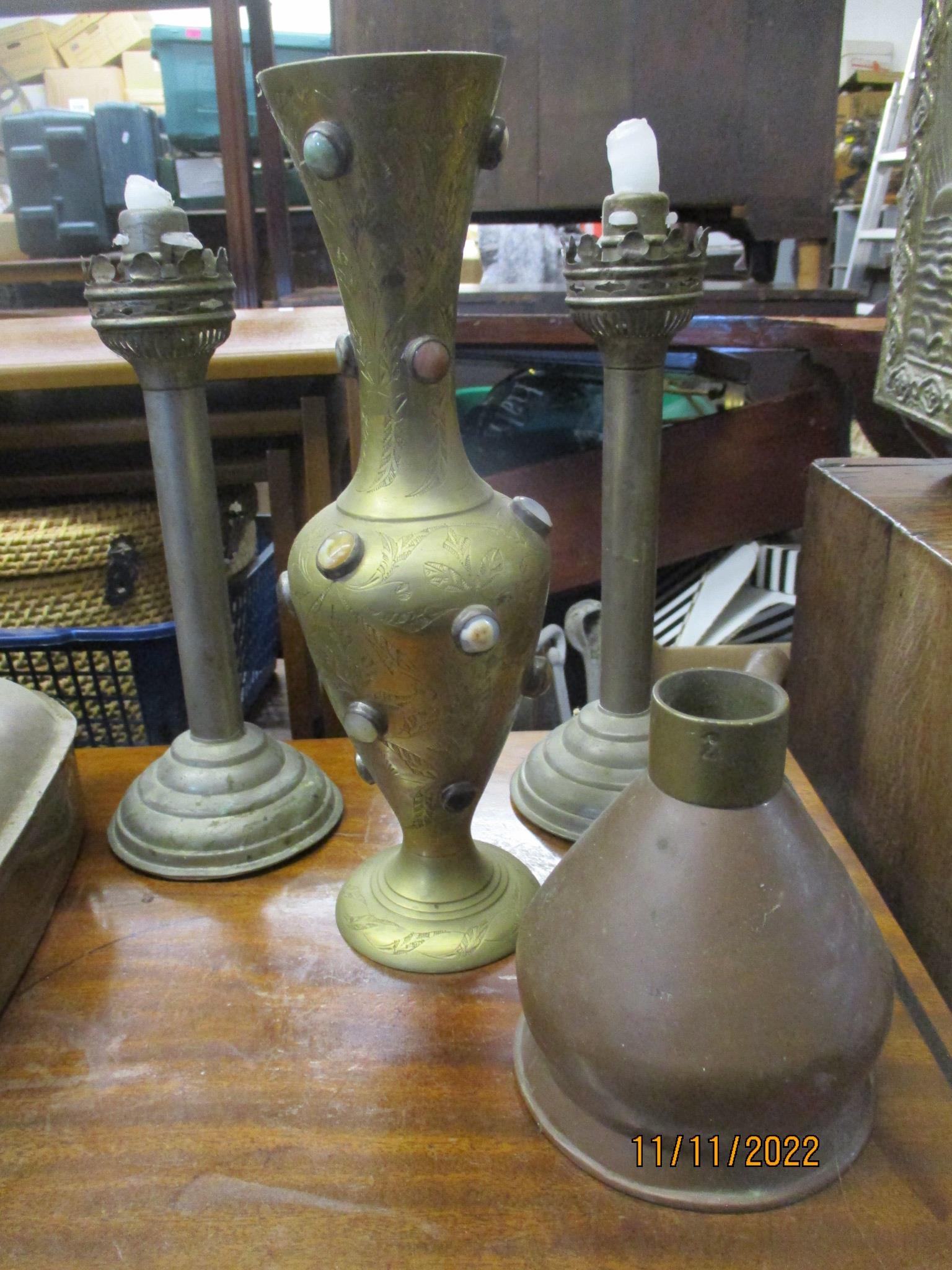 Metalware to include two coal scuttles, a slipper box, a magazine rack, candlesticks, teapot and